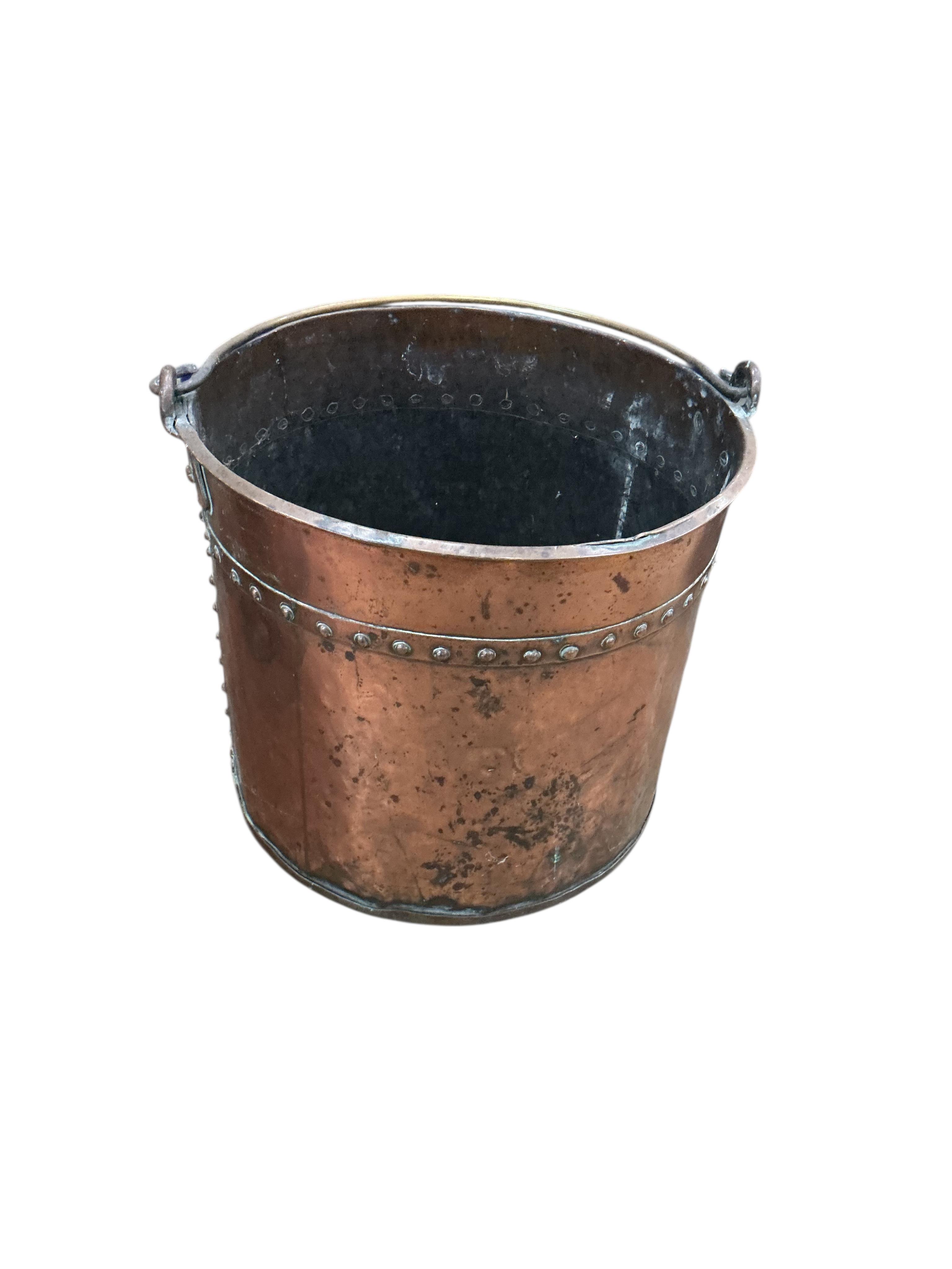 A near pair of 19th century copper coal buckets, larger diameter 35cm, height 30cm